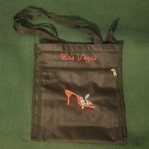 black embroidered Las Vegas purse with pockets
